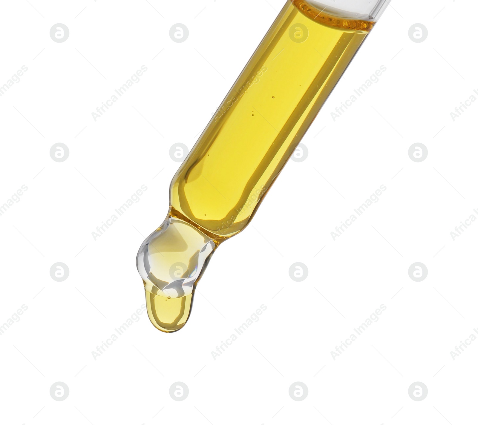 Photo of Dripping tincture from pipette isolated on white