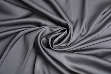 Photo of Texture of delicate black silk as background, top view