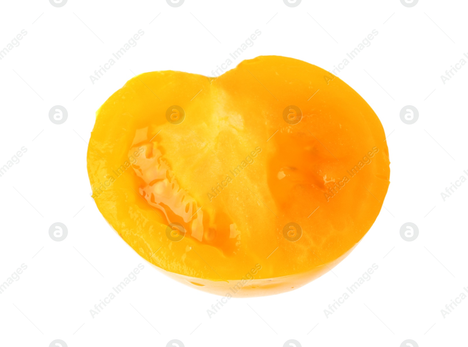 Photo of Slice of yellow tomato on white background