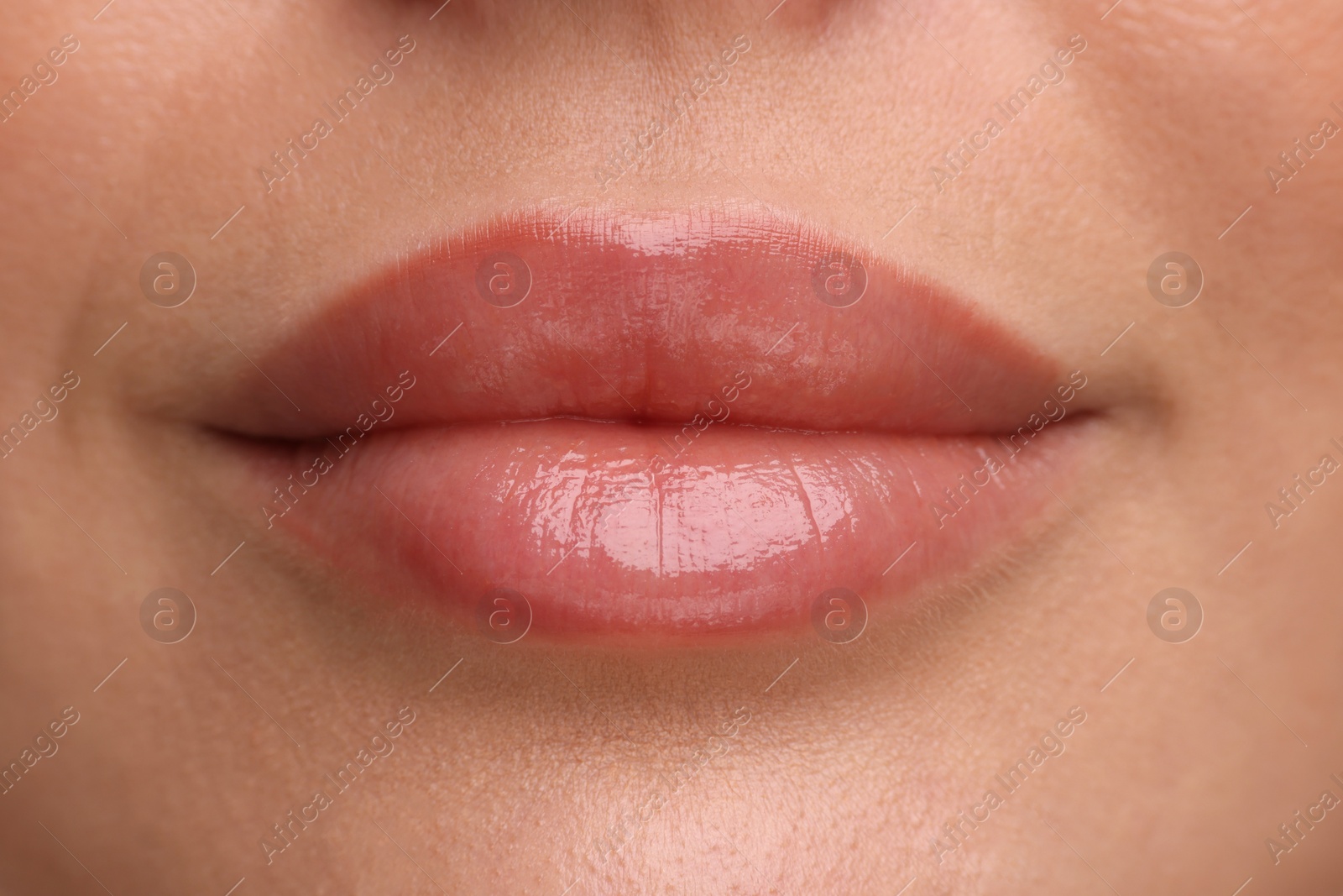 Photo of Woman with beautiful full lips as background, closeup