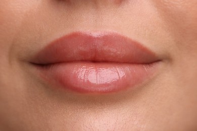 Woman with beautiful full lips as background, closeup