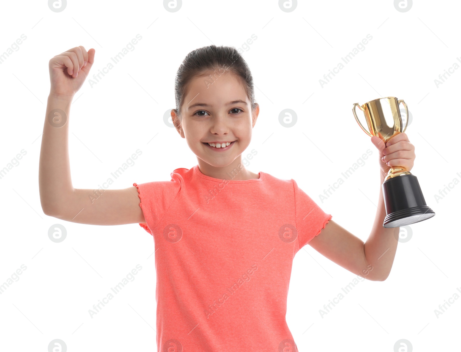 Photo of Happy girl with golden winning cup isolated on white