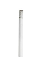 Cigarette with filter smoldering on white background