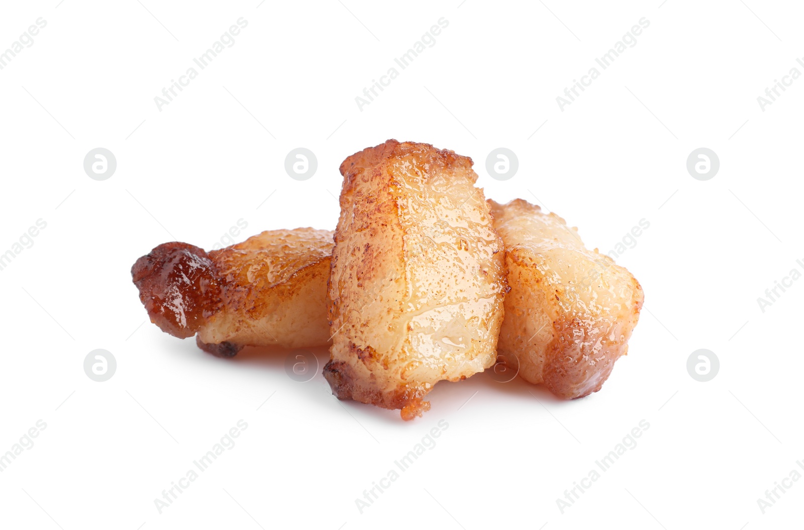 Photo of Tasty fried cracklings on white background. Cooked pork lard