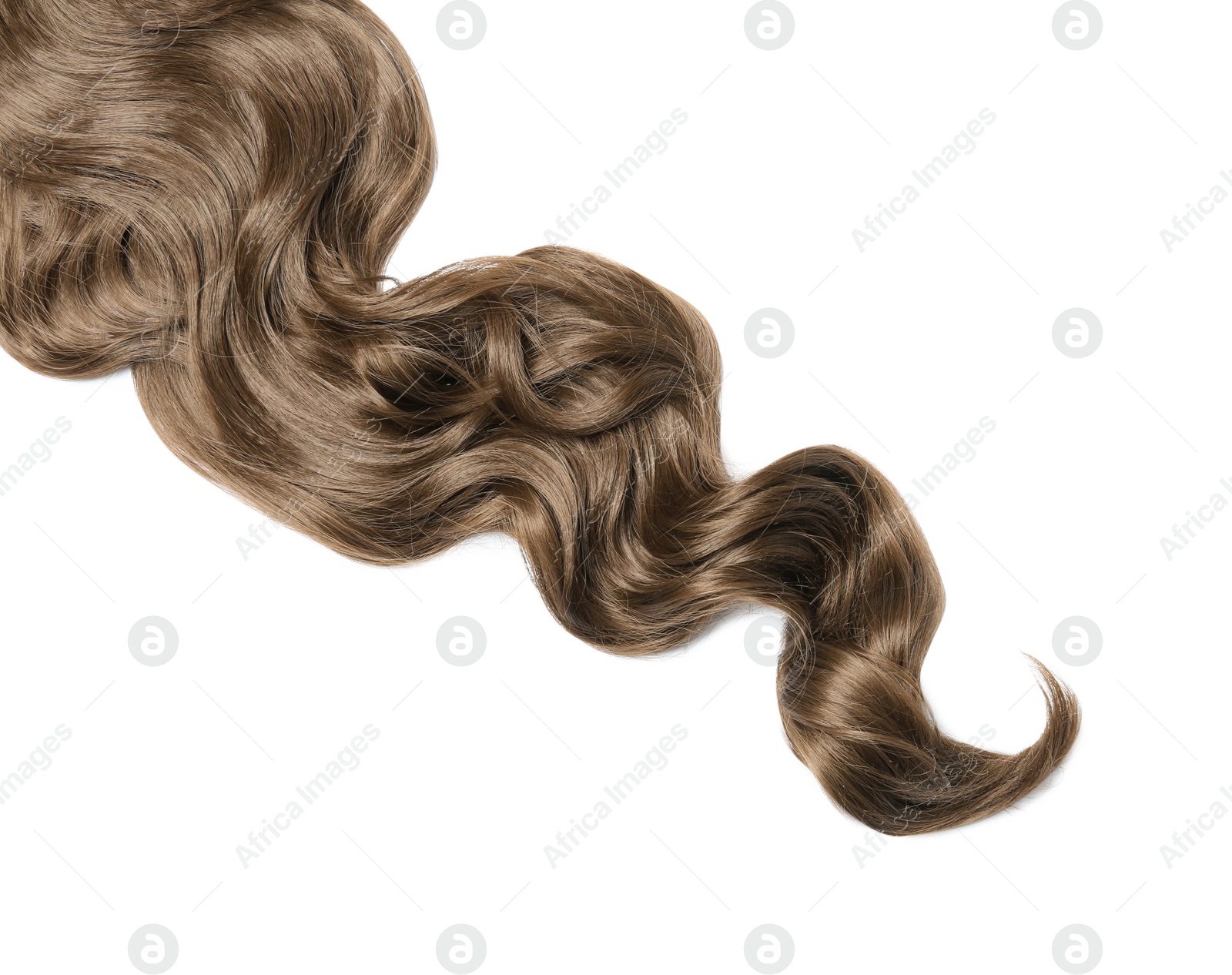Photo of Lock of brown wavy hair on white background, top view