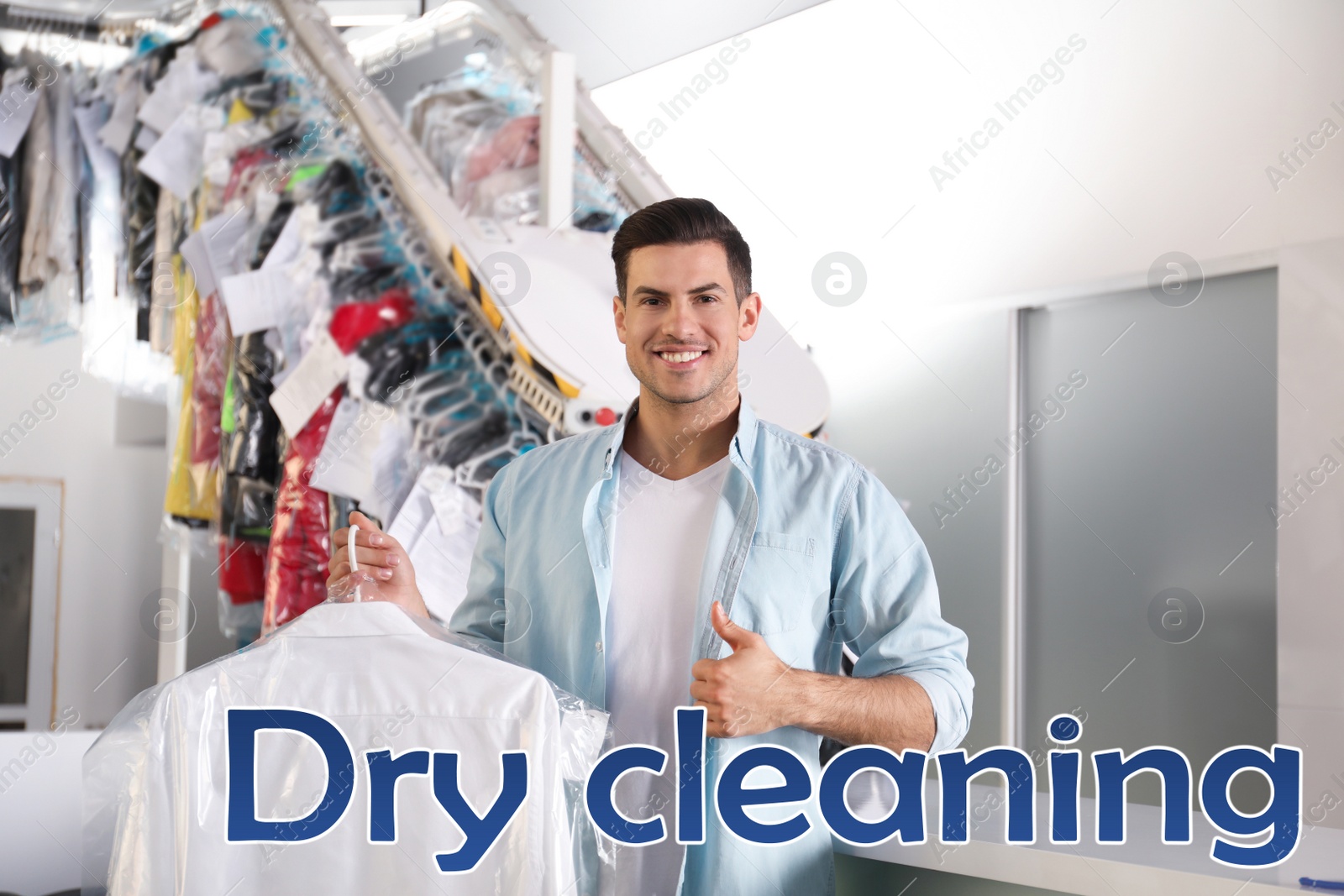 Image of Happy client with shirt at modern dry-cleaner's