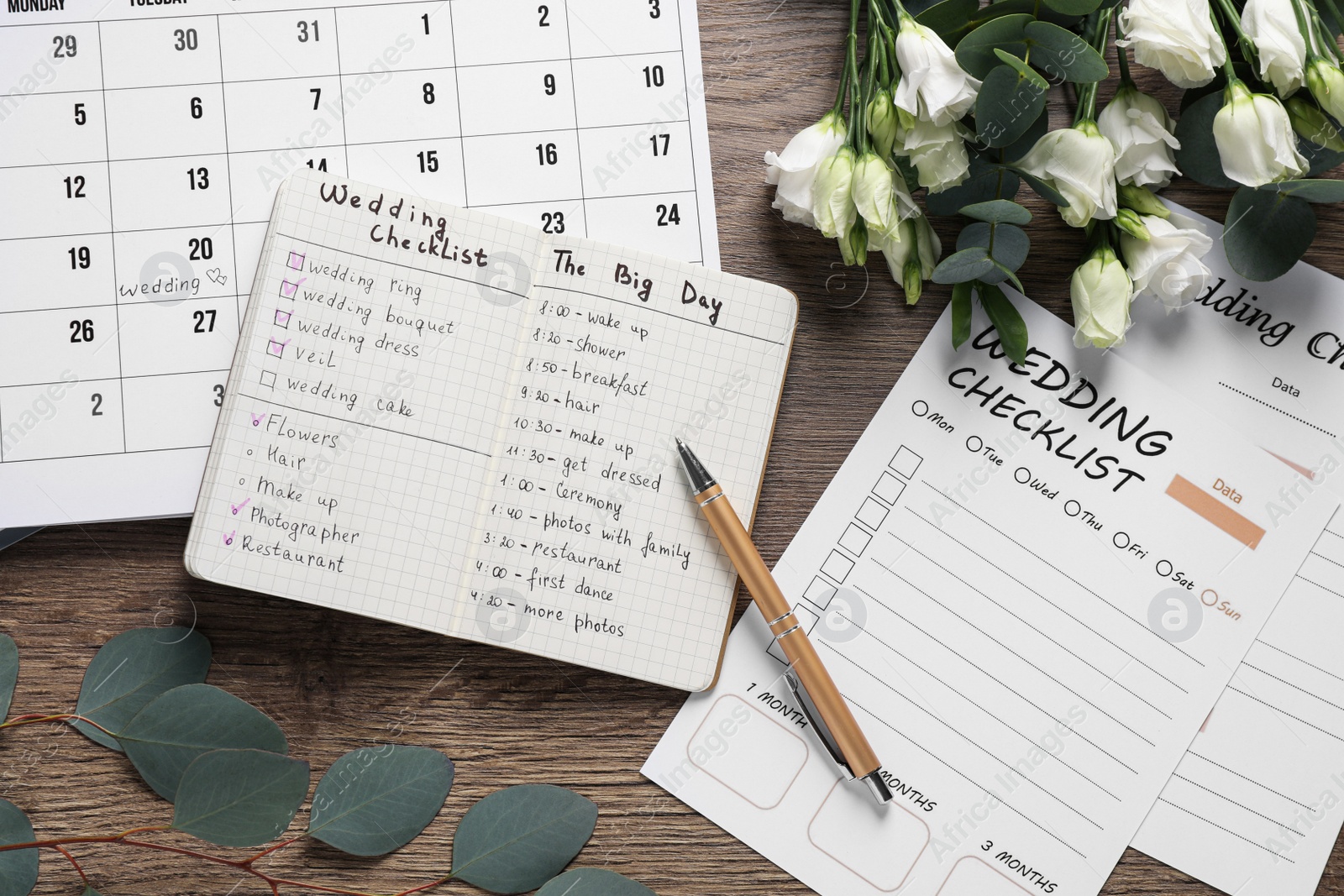 Photo of Flat lay composition with Wedding Planner on wooden table