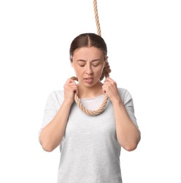 Photo of Depressed woman with rope noose on neck against white background