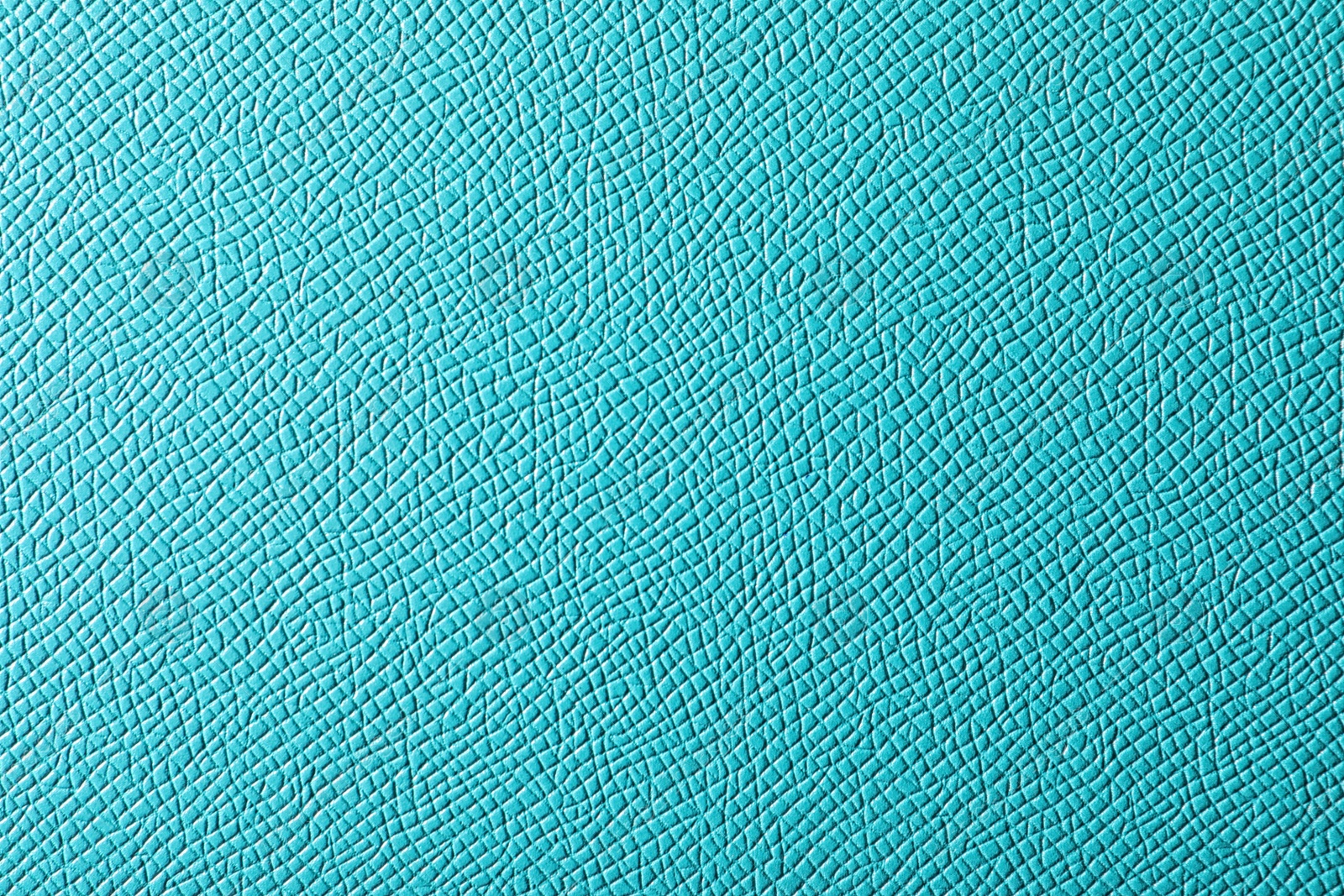 Photo of Texture of turquoise leather as background, closeup