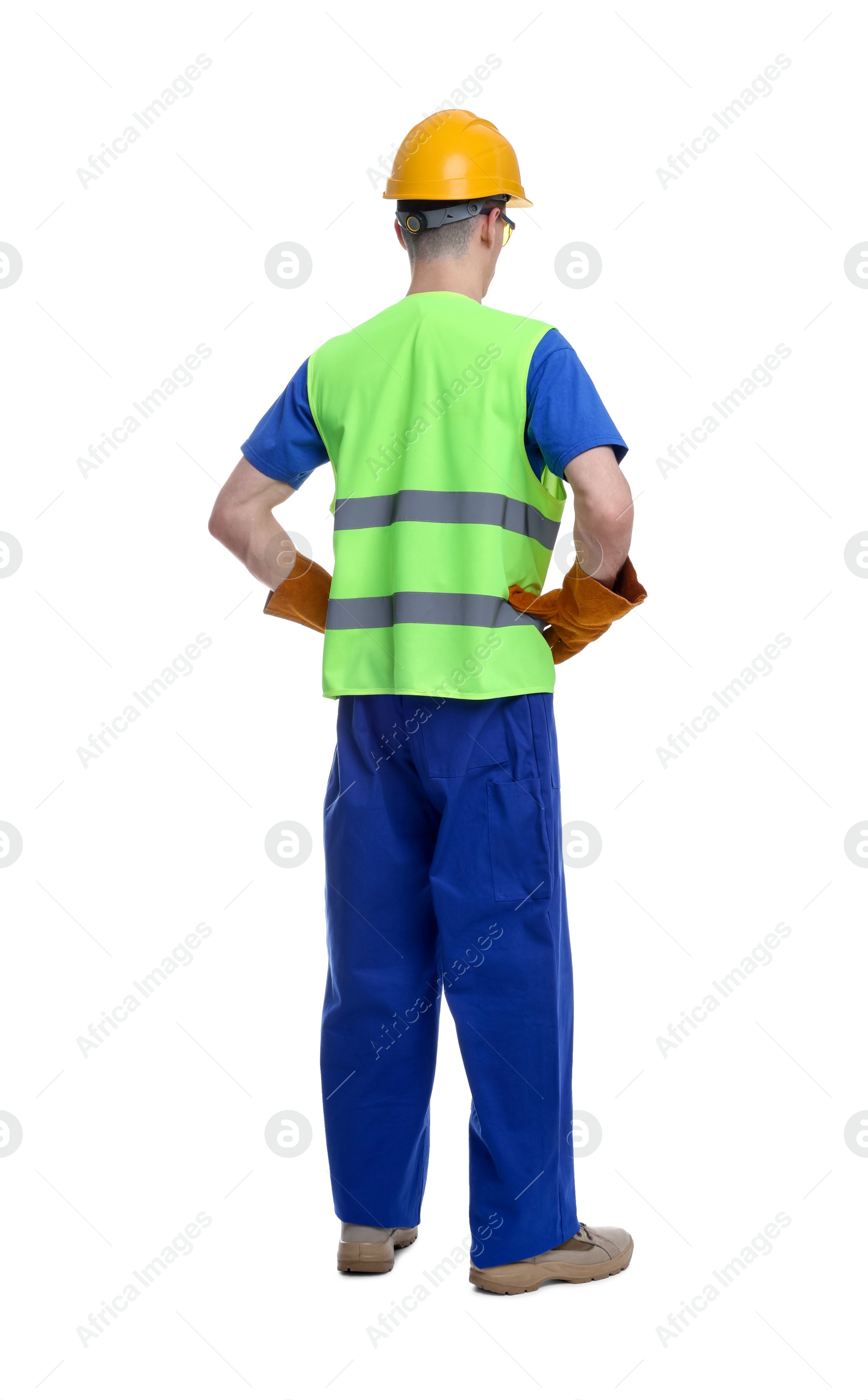 Photo of Young man wearing safety equipment on white background, back view