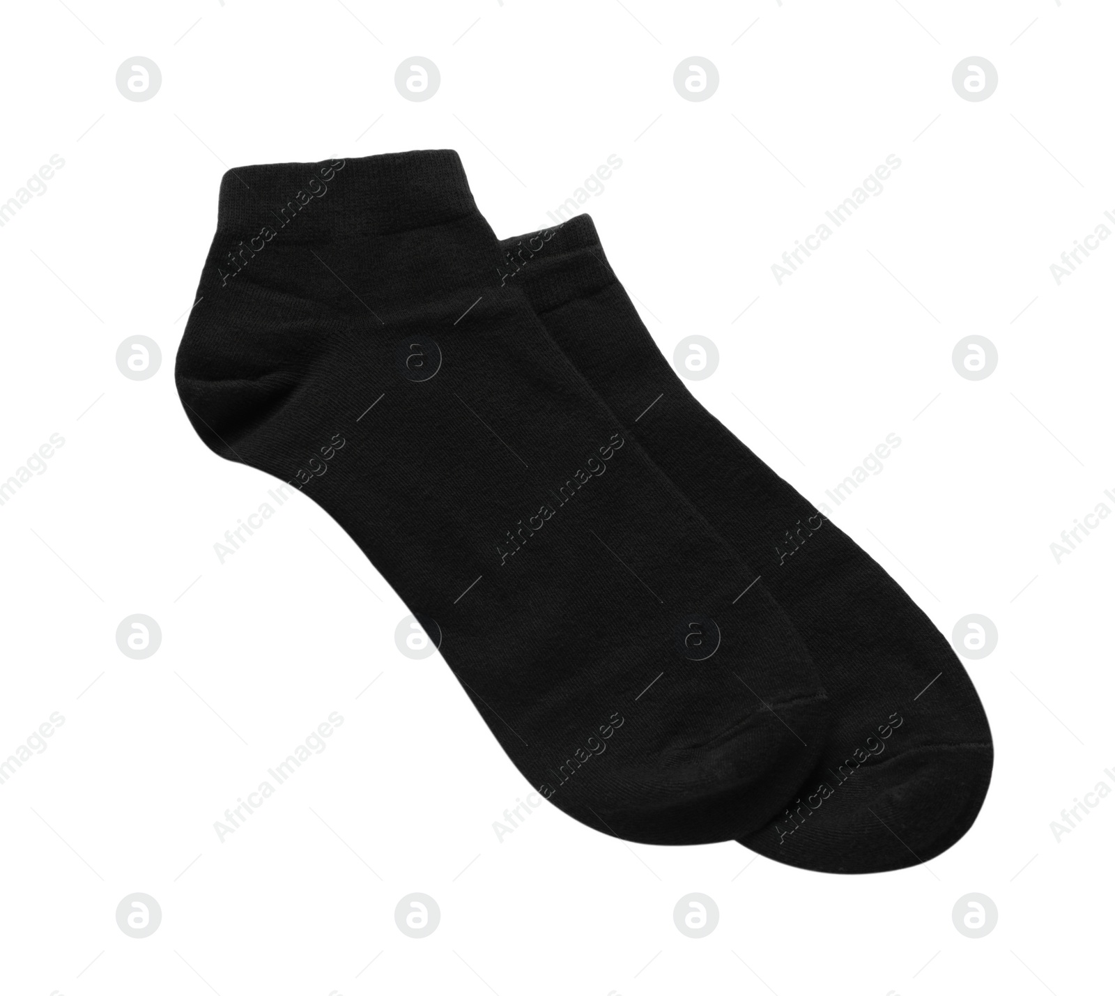 Photo of Pair of black socks on white background, top view