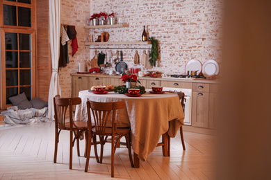 Beautiful kitchen interior with served dining table