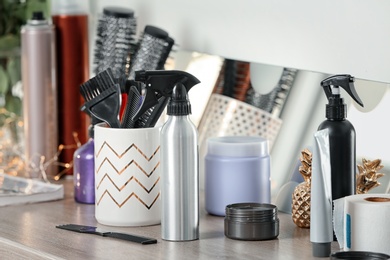 Photo of Professional hairdresser tools on table