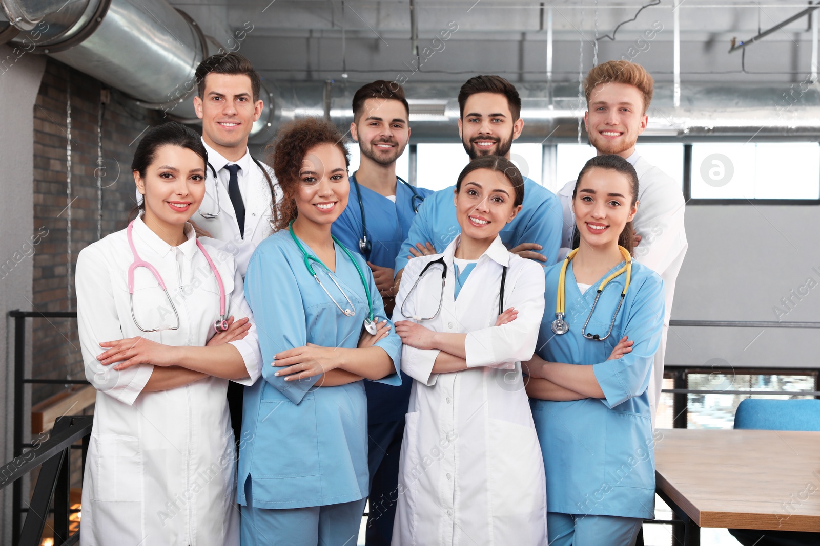 Photo of Team of medical workers in hospital. Unity concept