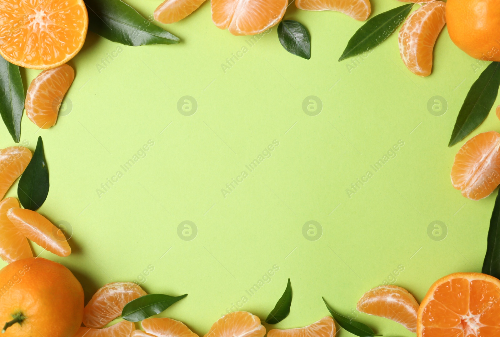 Photo of Composition with tangerines and leaves on color background, flat lay. Space for text