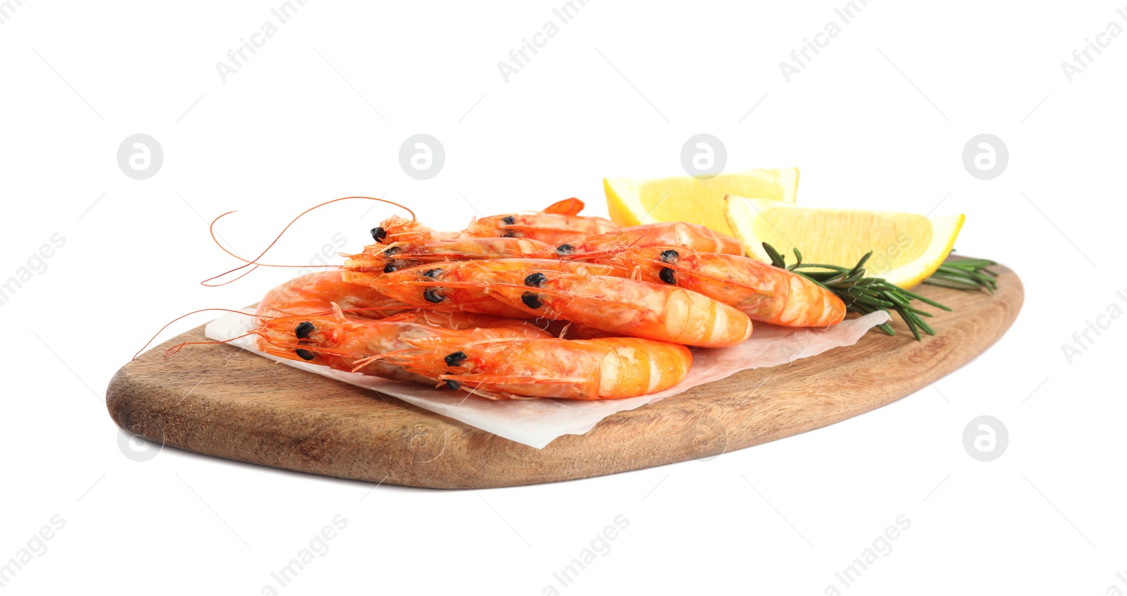 Photo of Delicious cooked shrimps served with lemon and rosemary on white background