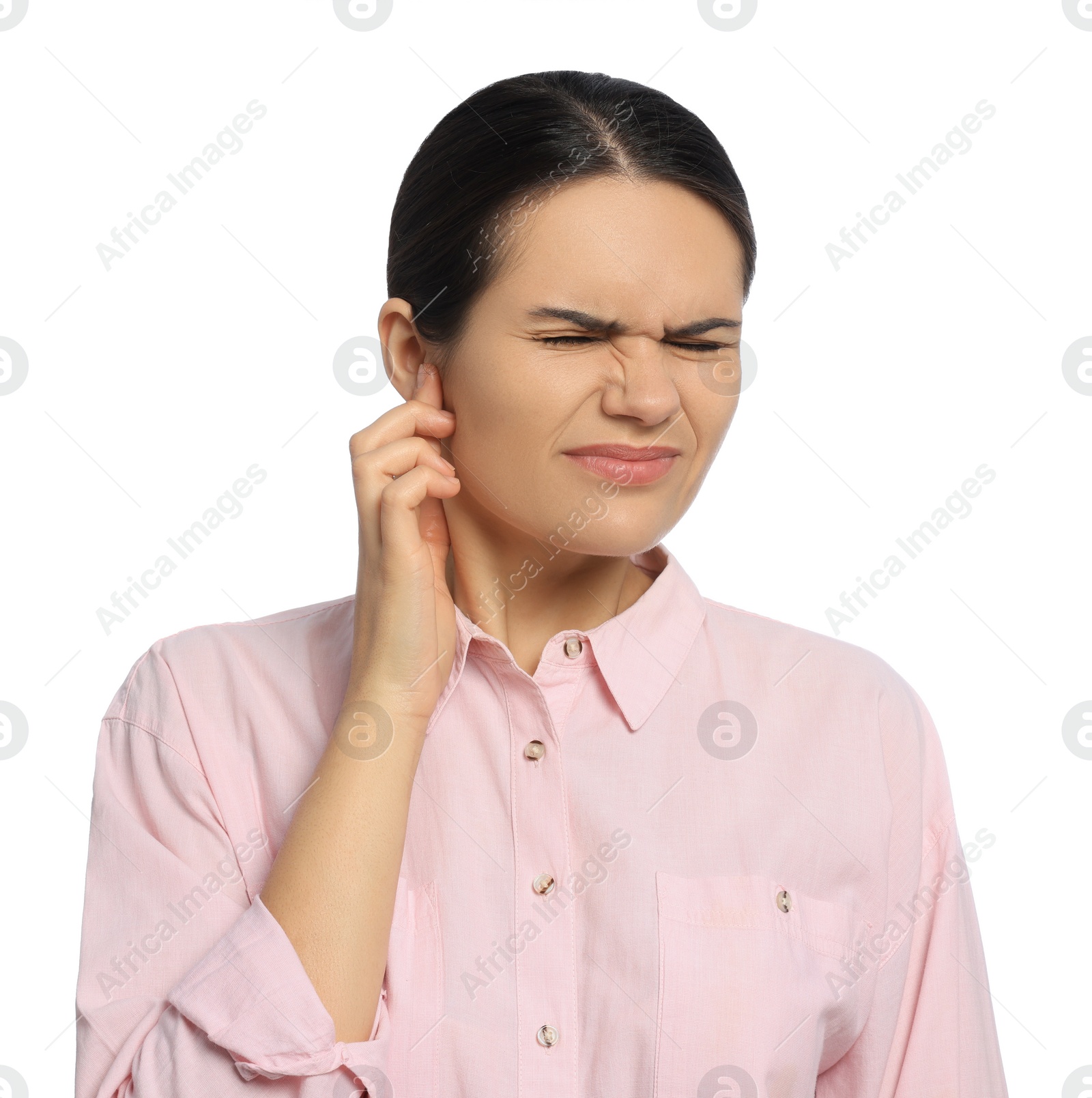 Photo of Young woman suffering from ear pain on white background