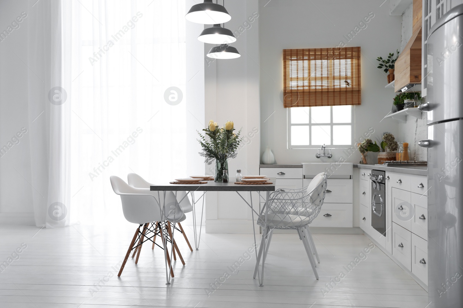 Photo of Beautiful kitchen interior with new stylish furniture