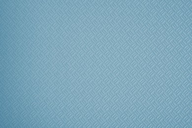 Image of Blue wallpaper sheet as background, top view