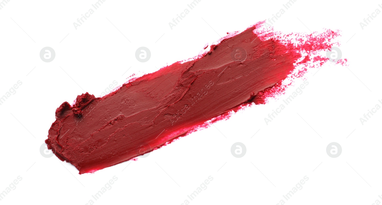 Photo of Smear of bright lipstick on white background, top view