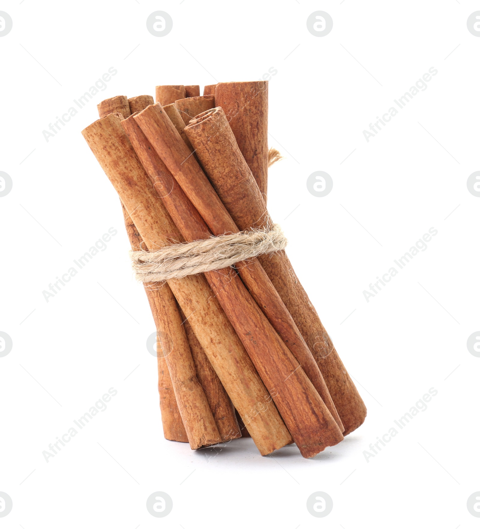 Photo of Tied cinnamon sticks on white background