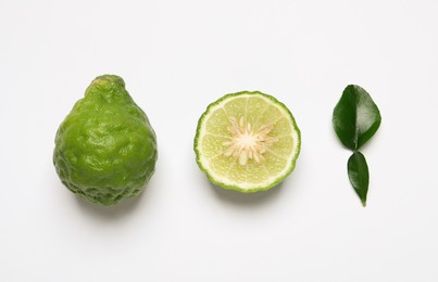 Flat lay composition with ripe bergamot fruits on white background