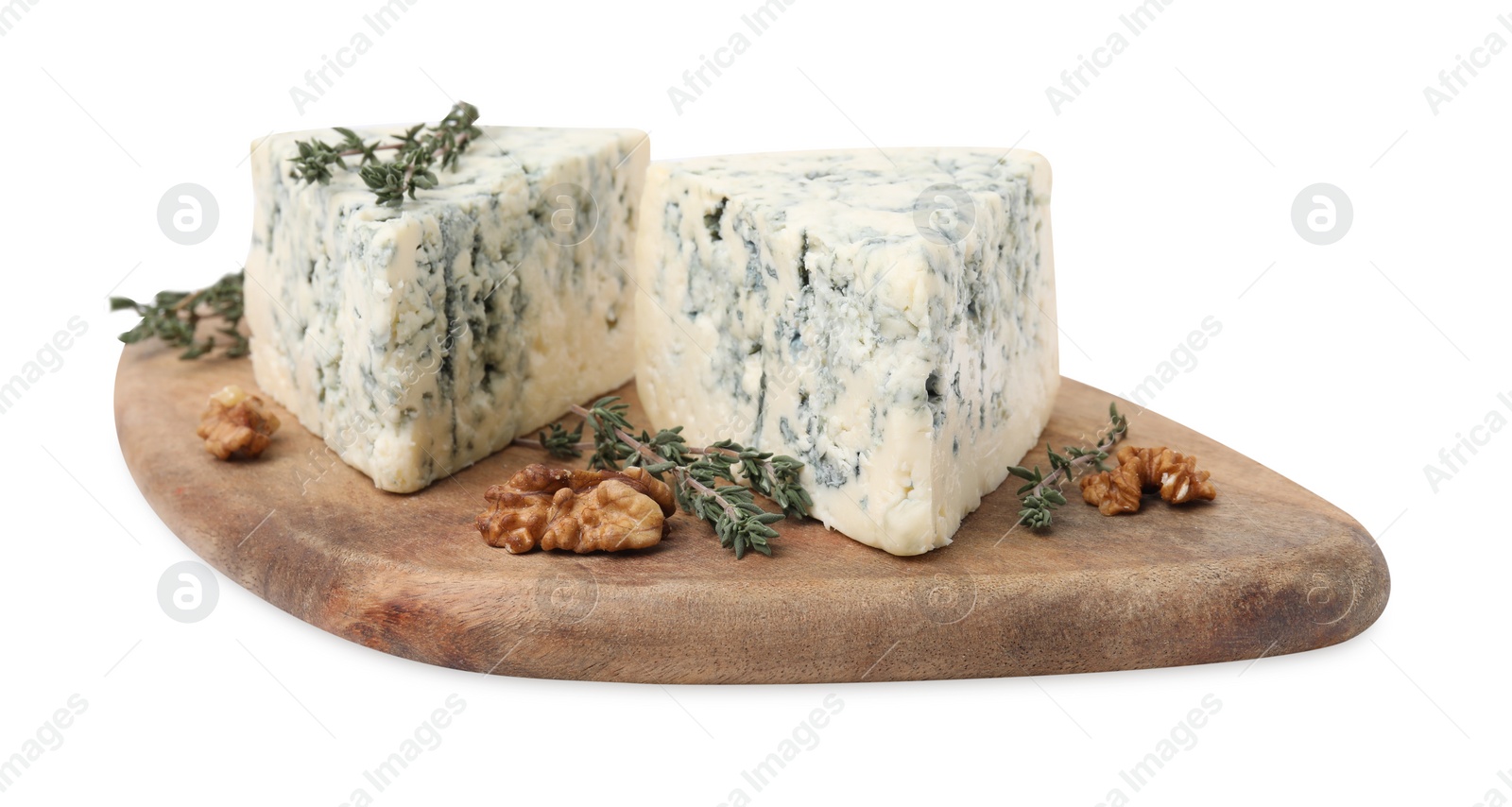 Photo of Tasty blue cheese with thyme and walnuts isolated on white