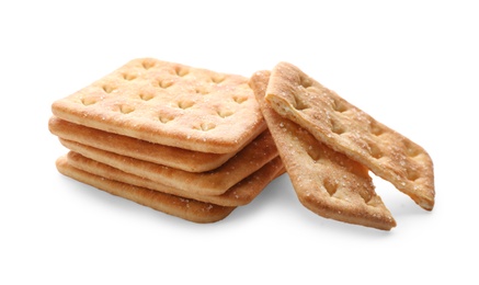 Photo of Stack of delicious crispy crackers isolated on white