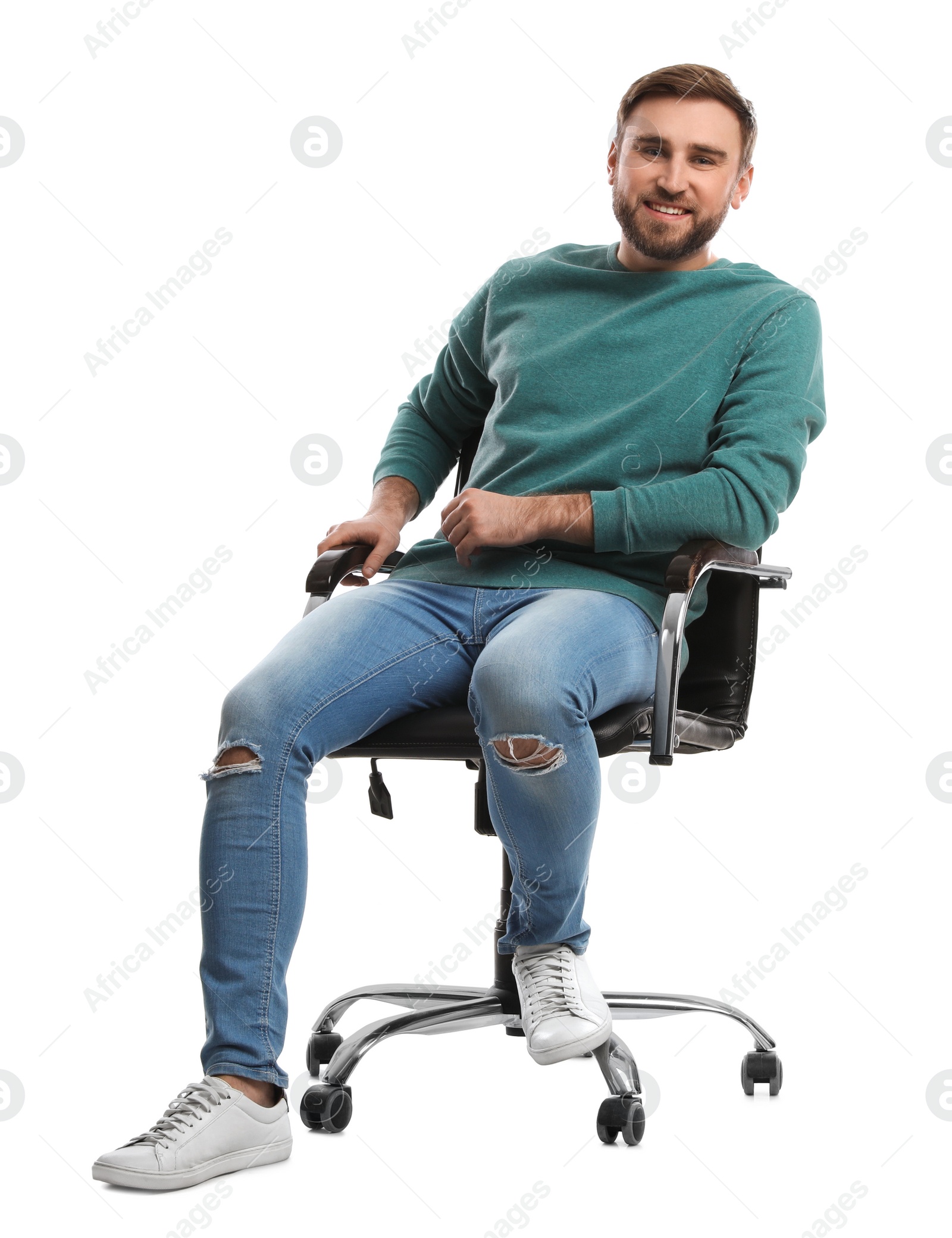 Photo of Young man sitting in comfortable office chair on white background