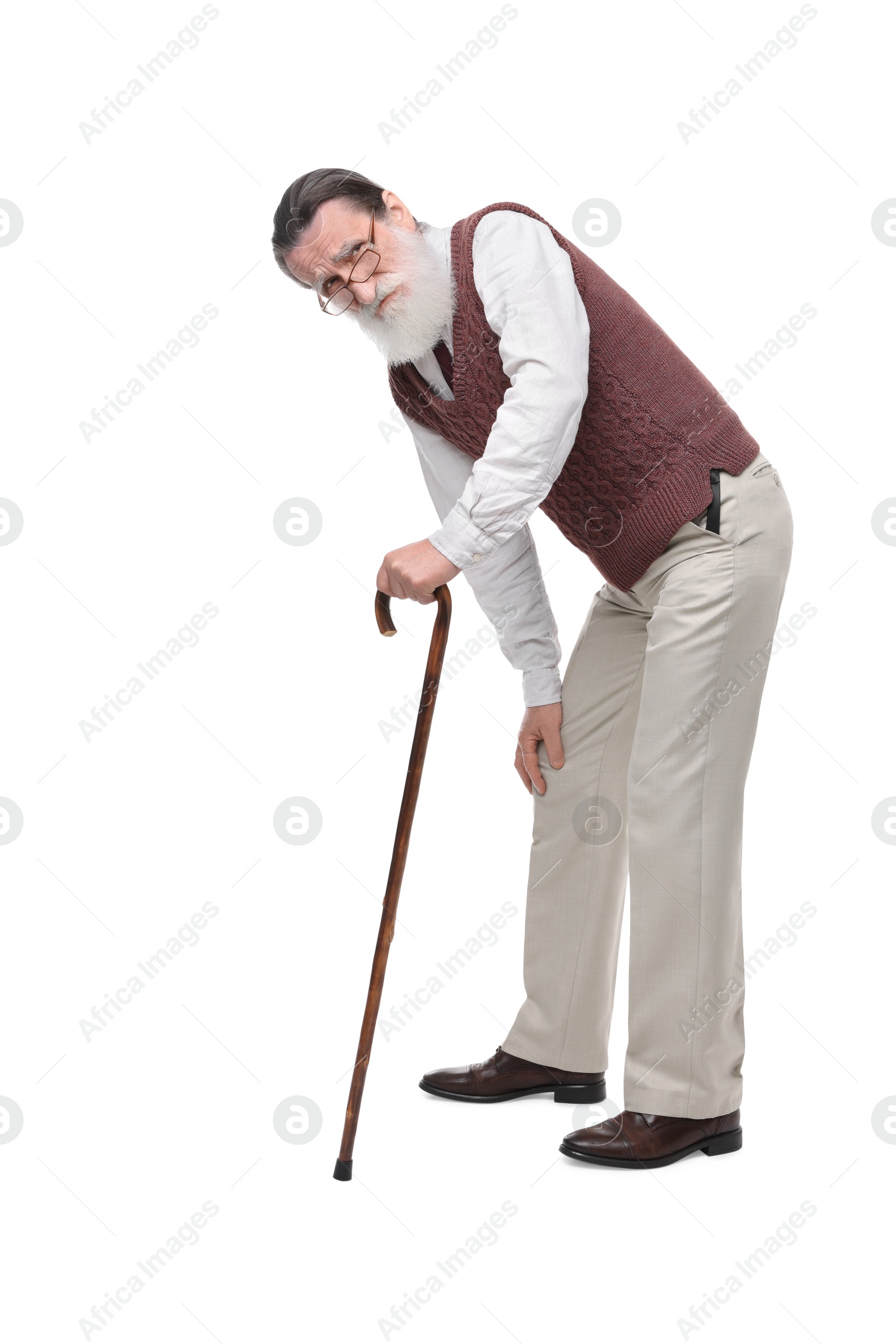 Photo of Stooped senior man with walking cane on white background