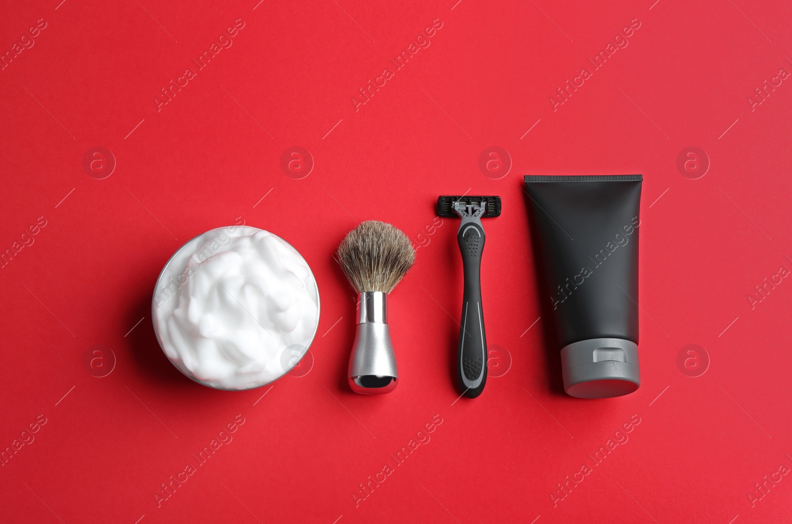 Photo of Set of shaving equipment and men's cosmetic products on color background, flat lay