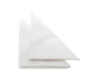 Photo of Folded clean paper tissues on white background, top view