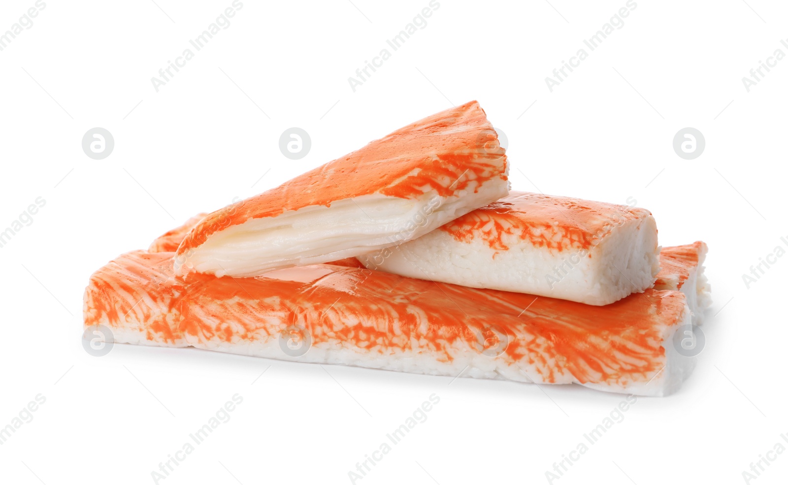Photo of Fresh delicious crab sticks on white background