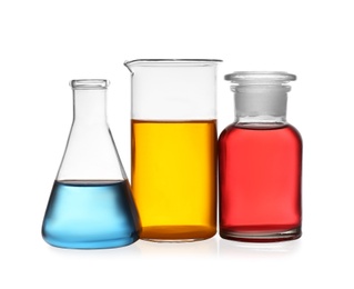 Photo of Set of lab glassware with color liquids isolated on white. Solution chemistry