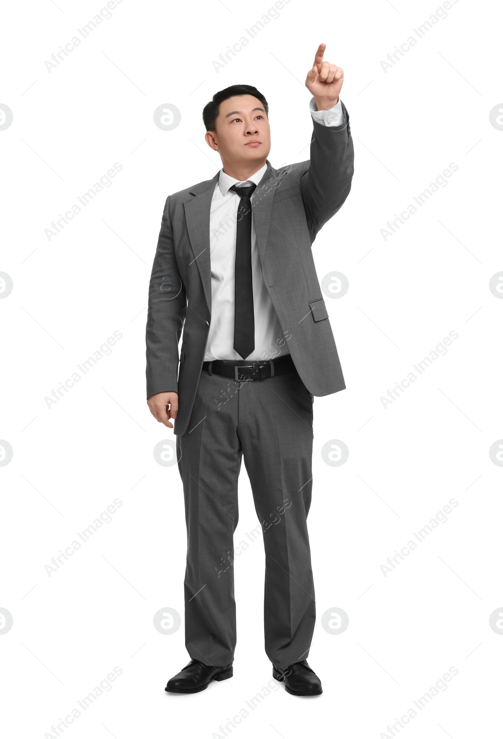 Photo of Businessman in suit posing on white background