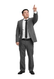 Businessman in suit posing on white background