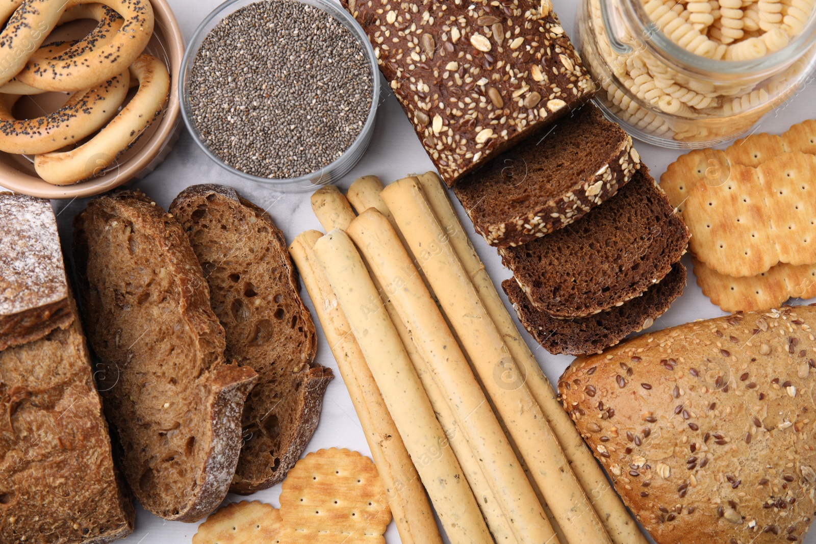 Photo of Different gluten free products on white background, flat lay