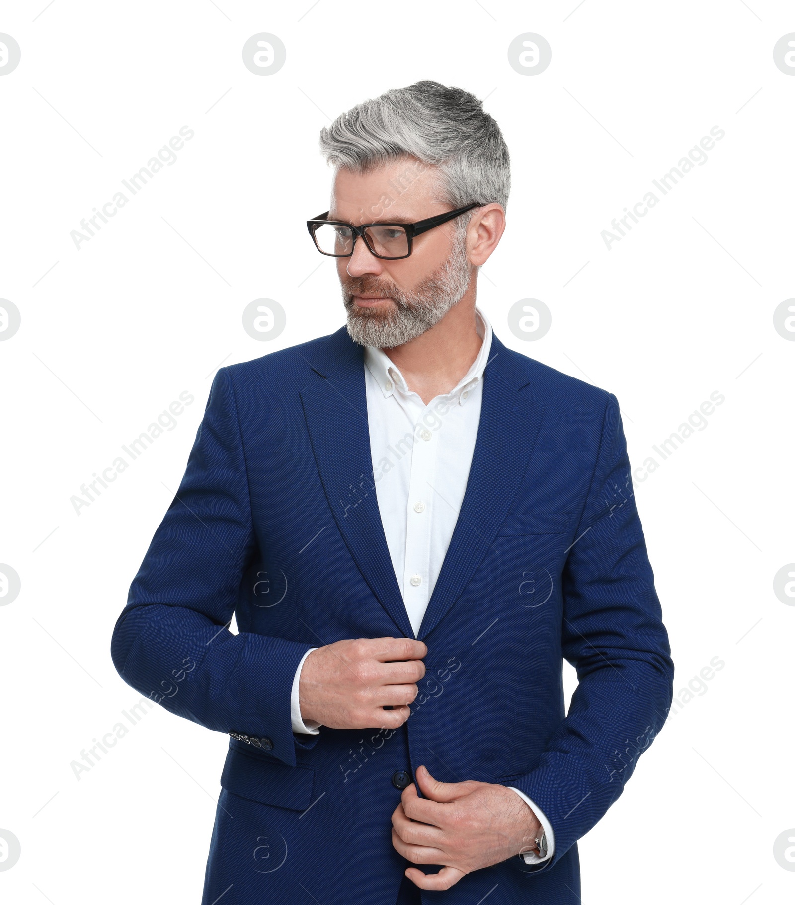 Photo of Mature businessman in stylish clothes posing on white background