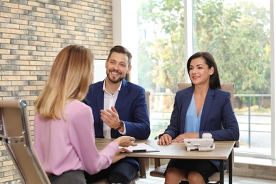 Human resources commission conducting job interview with applicant in office