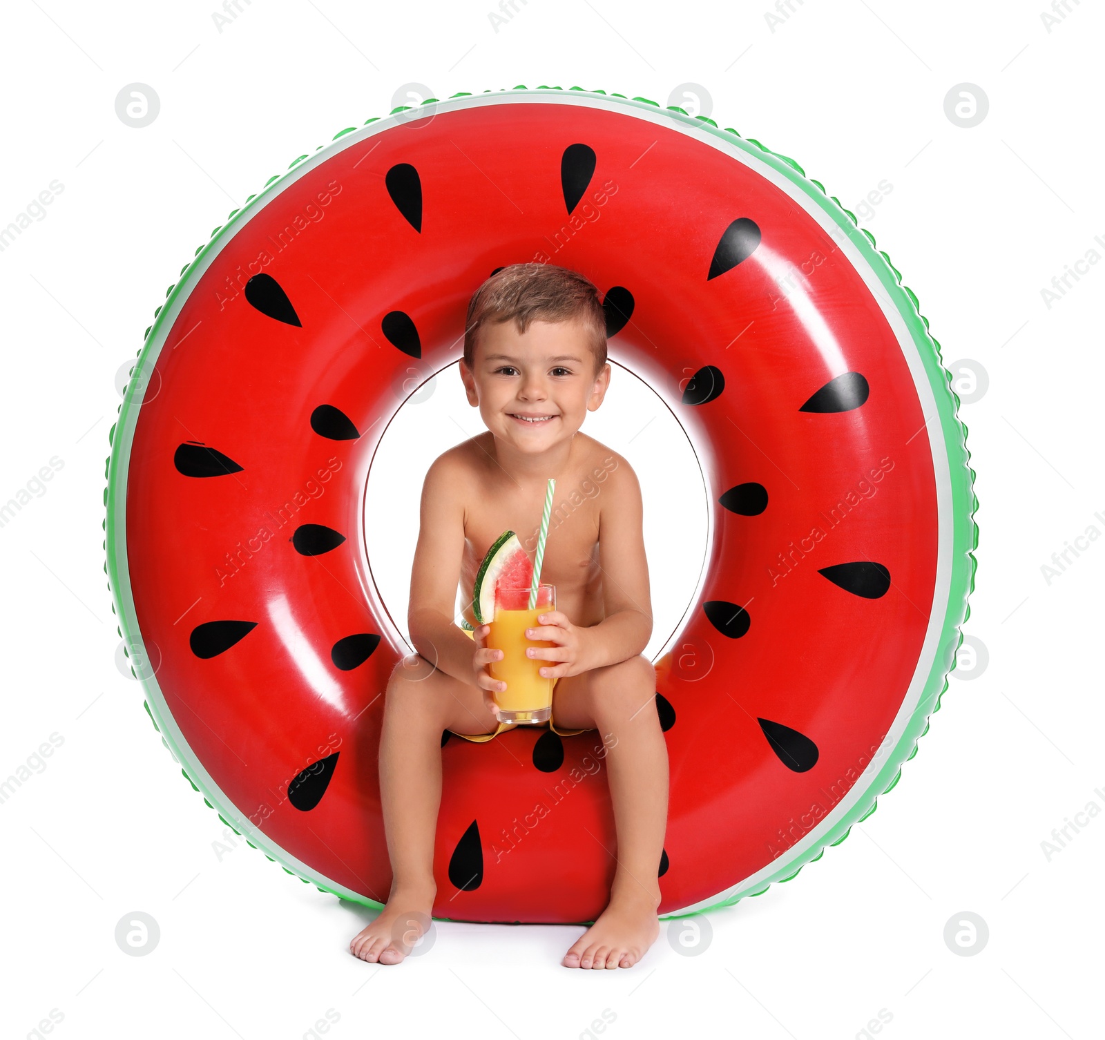 Photo of Cute little boy with inflatable ring and glass of cocktail on white background