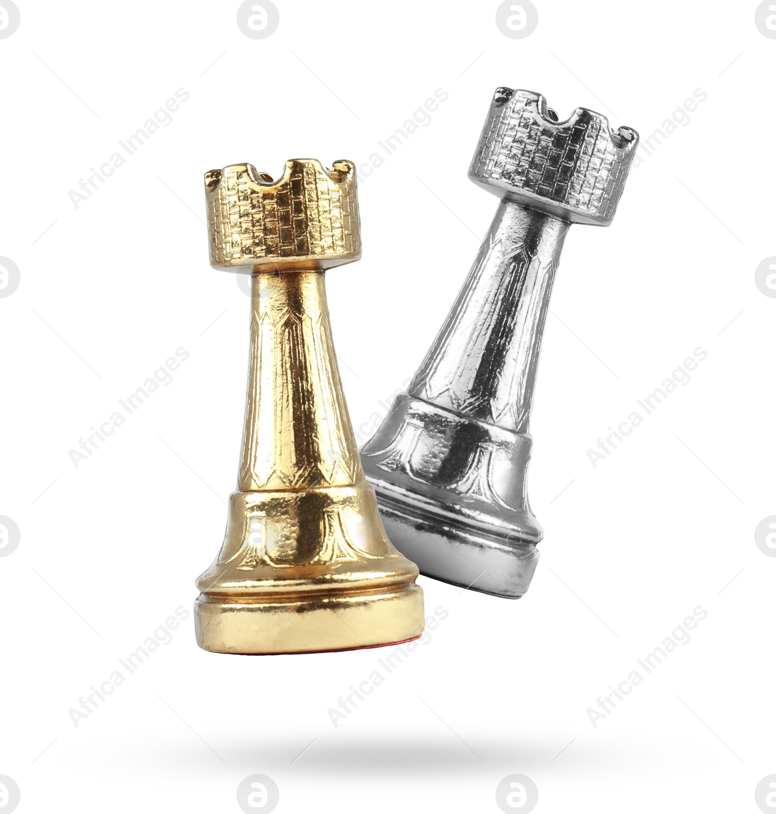 Image of Golden and silver chess rooks in air on white background