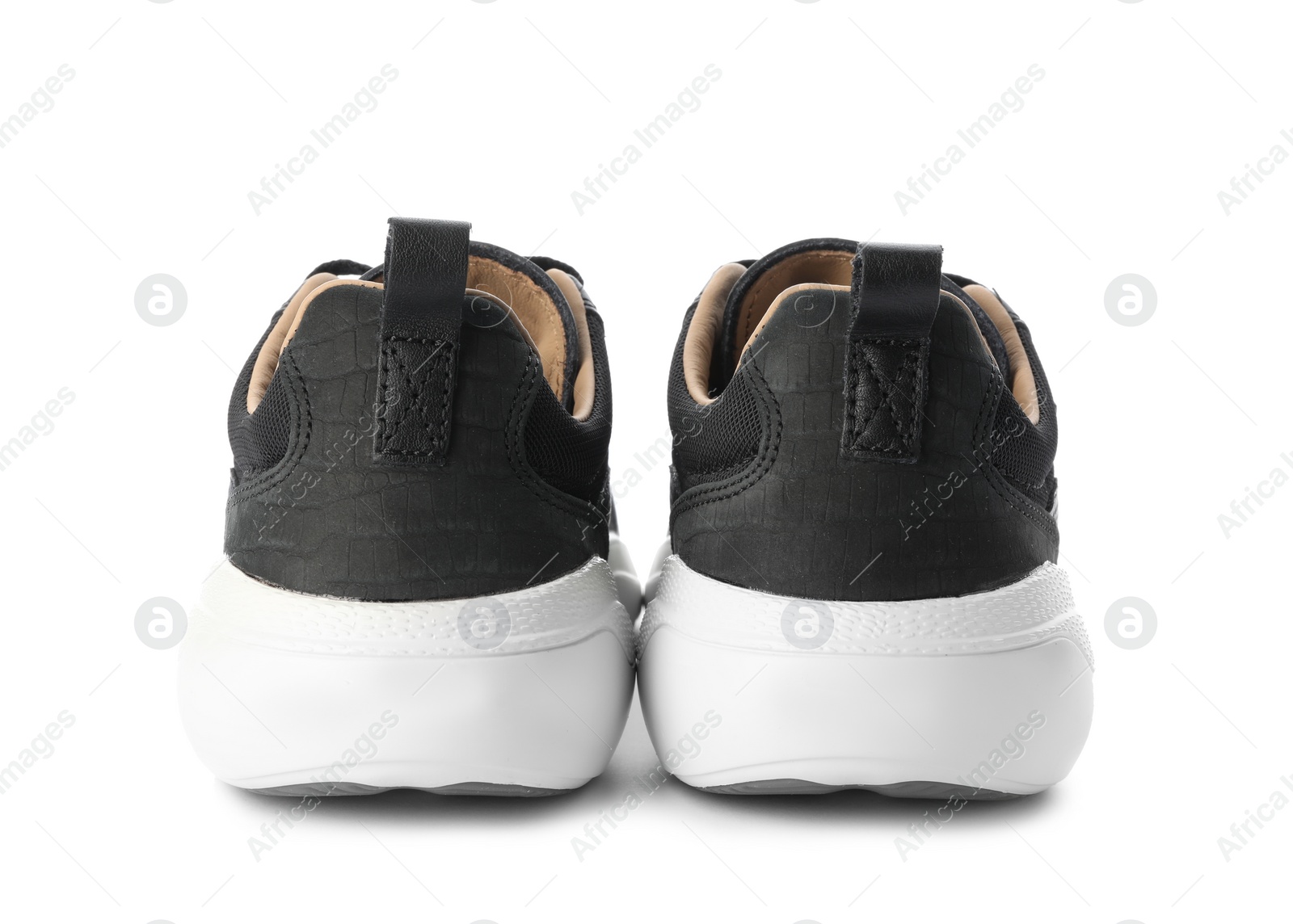 Photo of Pair of stylish shoes on white background