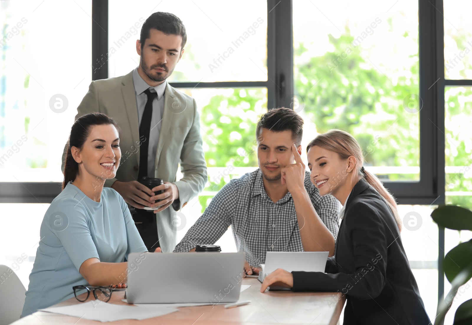 Photo of Office employees having business training at workplace