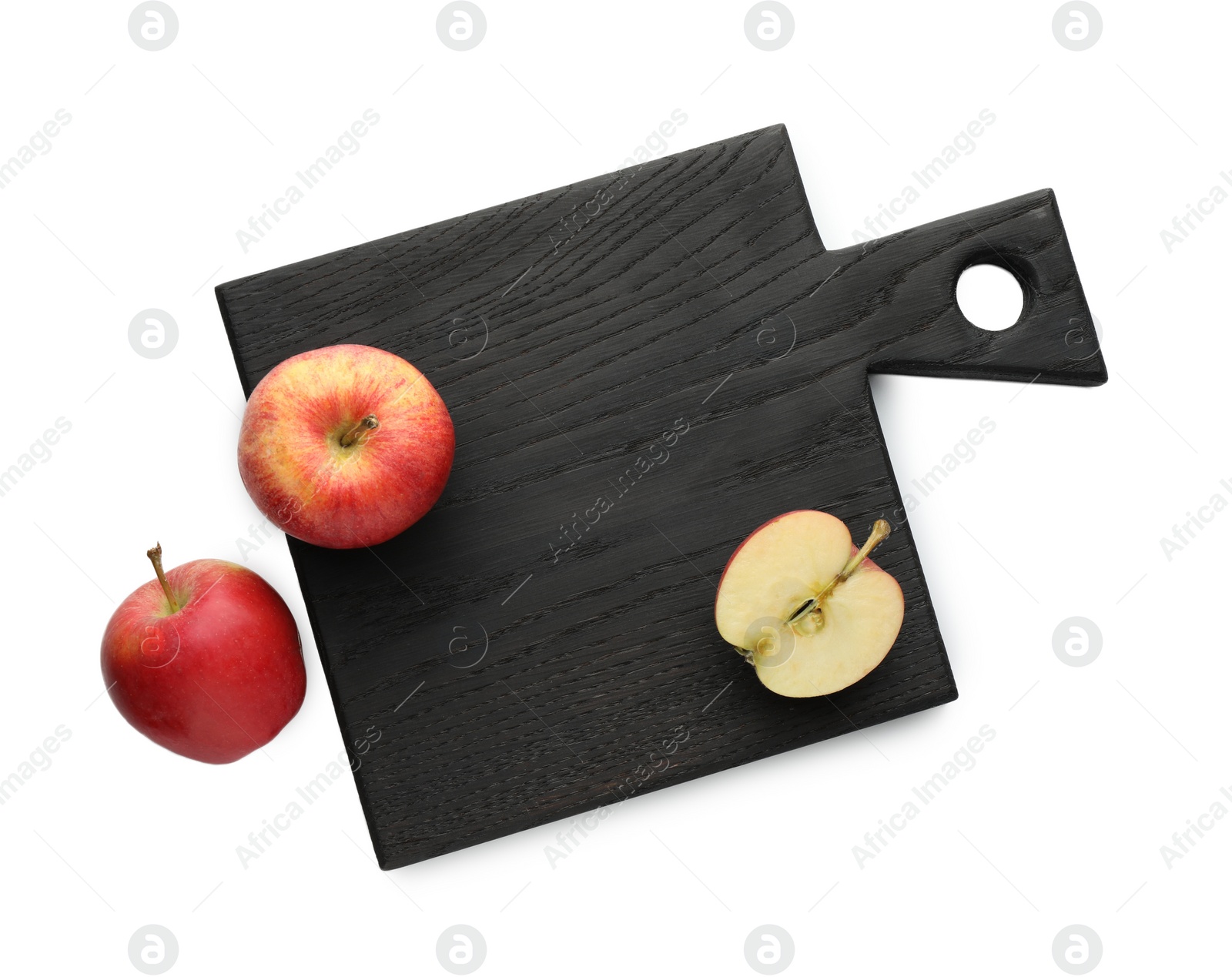 Photo of Black cutting board with fresh apples isolated on white, top view