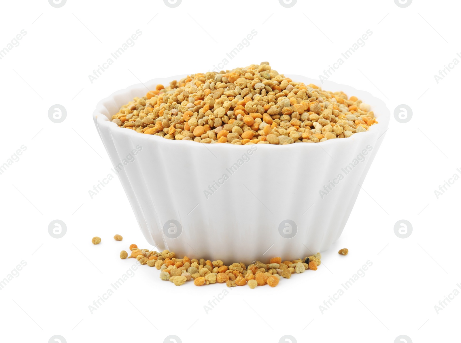 Photo of Fresh bee pollen granules in bowl isolated on white