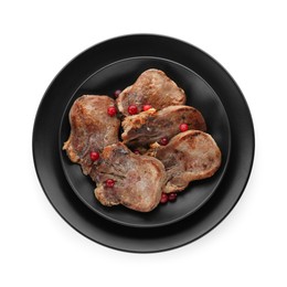 Photo of Tasty beef tongue pieces isolated on white, top view