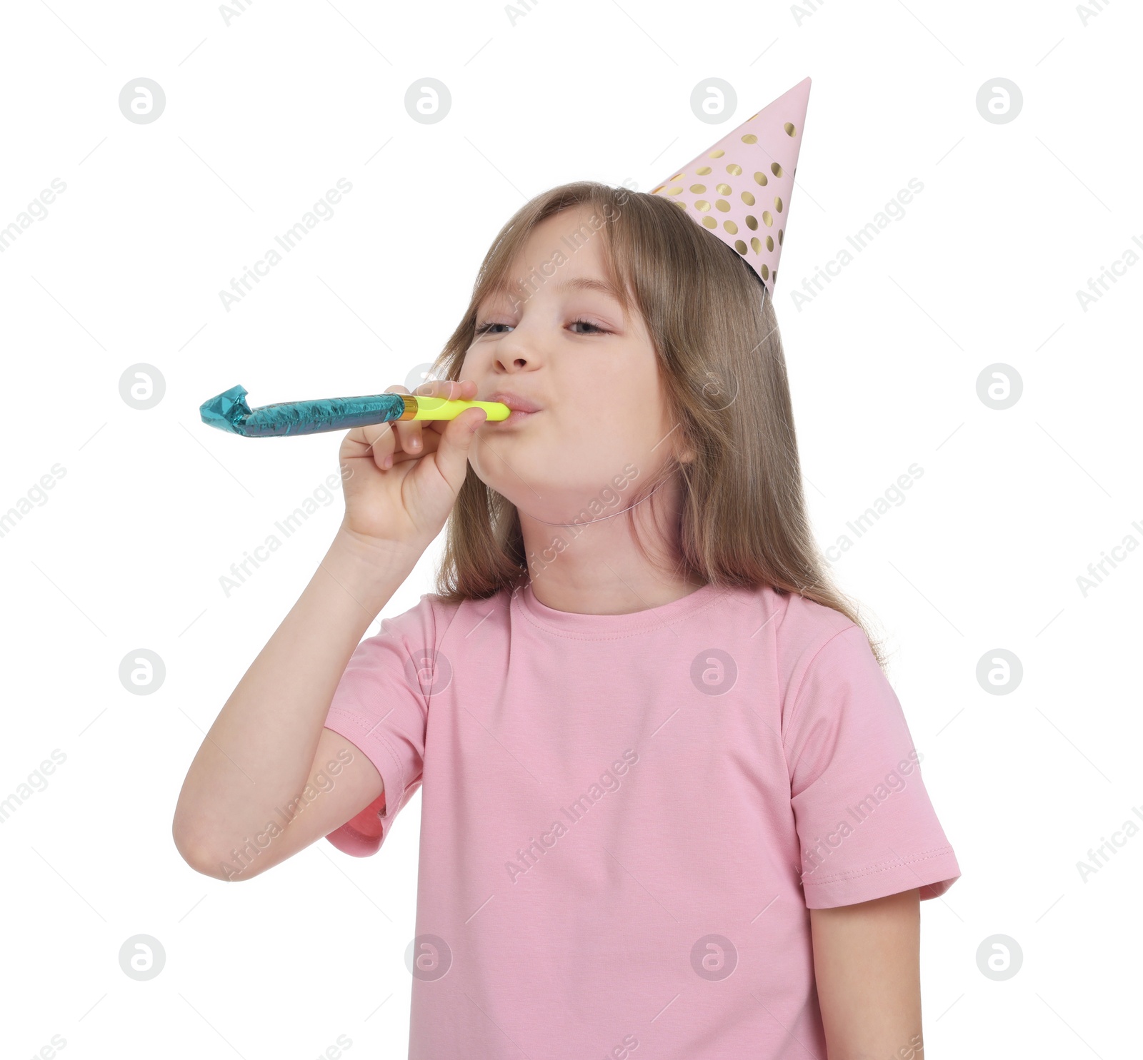 Photo of Cute little girl in party hat with blower on white background