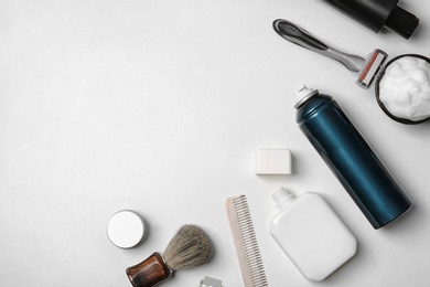 Photo of Flat lay composition with men's shaving accessories and space for text on white background