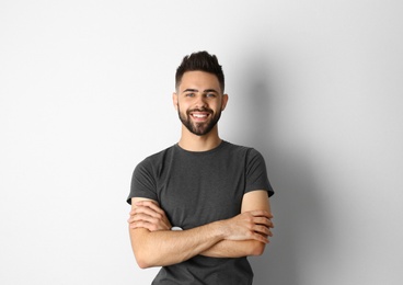 Portrait of handsome smiling man isolated on white