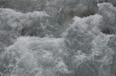 Photo of Running flow of clean water, above view